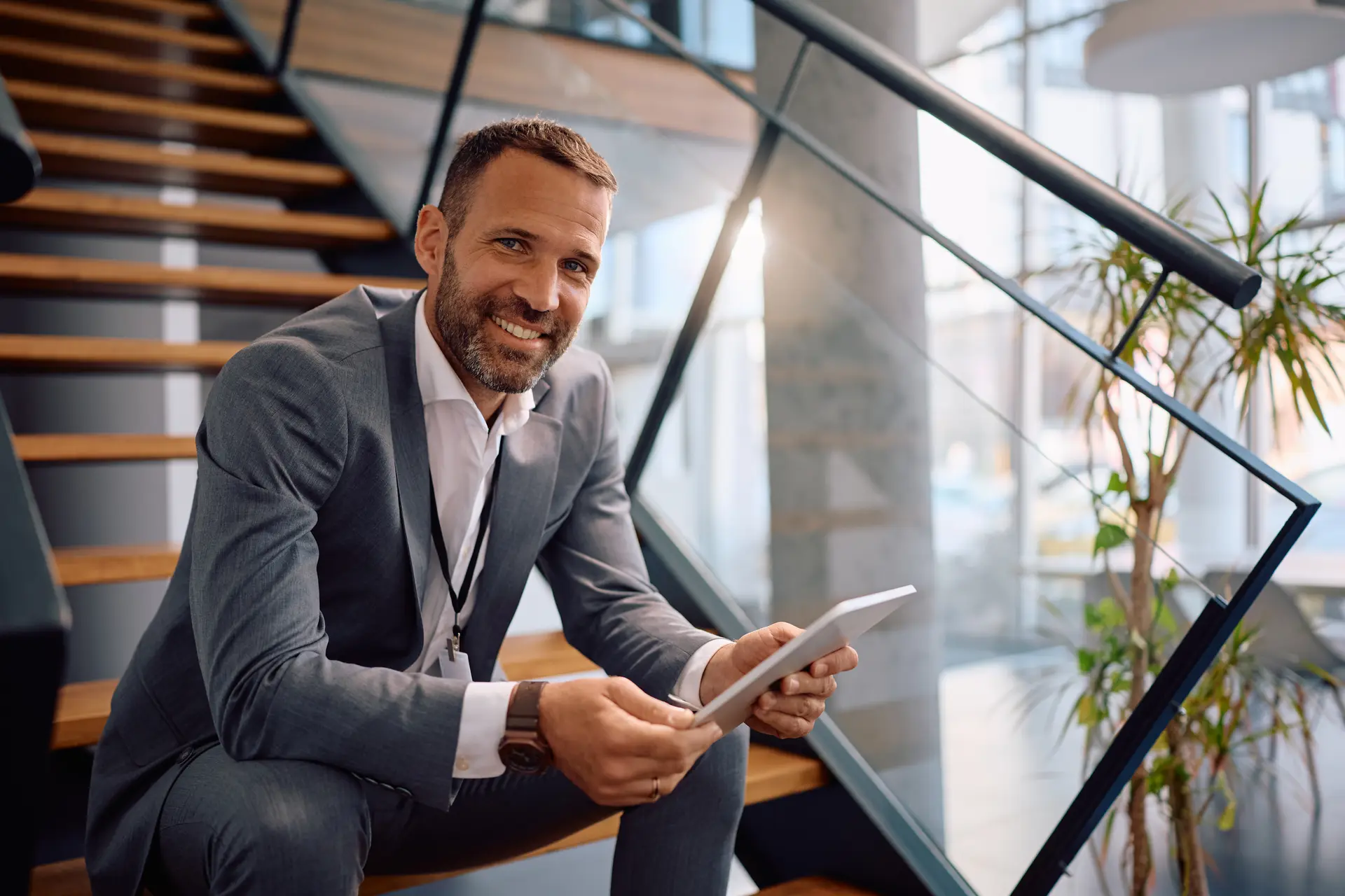 Happy Entrepreneur Using Touchpad While Relaxing O 2026 03 25 03 23 56 Utc