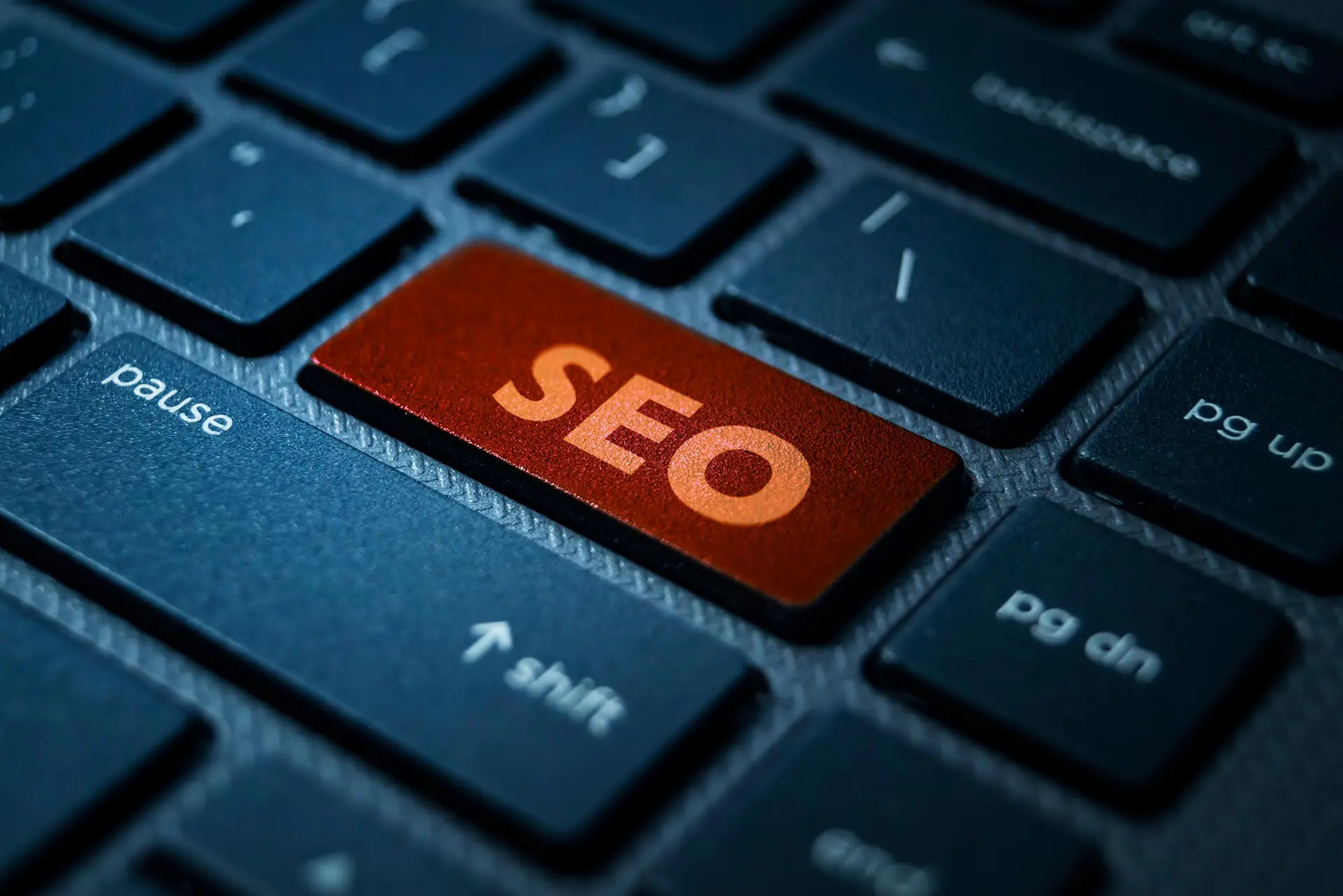 Seo Red Button On Blue Keyboard Close Up 2026 03 25 06 29 14 Utc