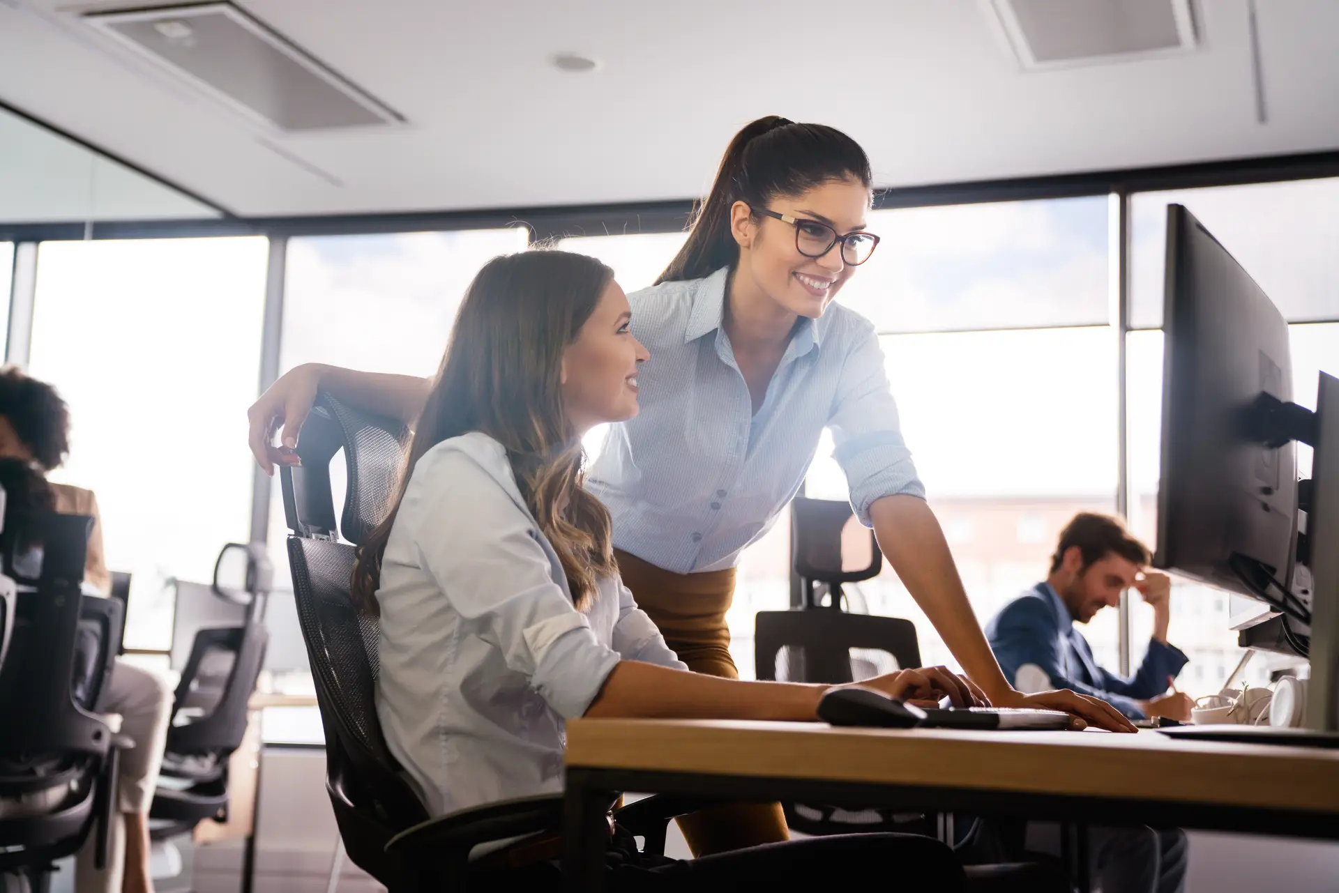 Two Businesswomen Working Together At Computer In 2026 03 24 04 06 31 Utc